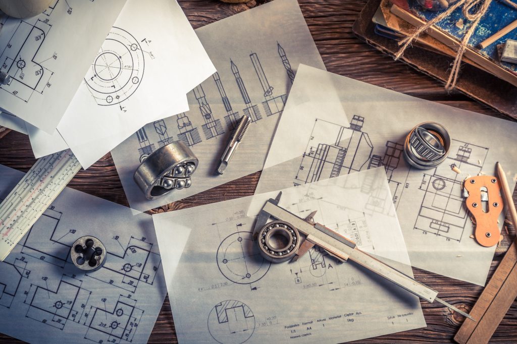 Designing mechanical parts by engineer as education concept