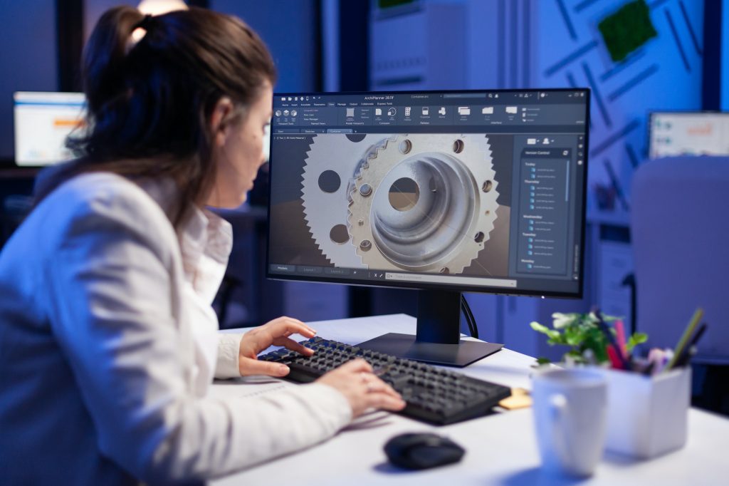 Woman engineer working on new digital prototype using professional construction equipment